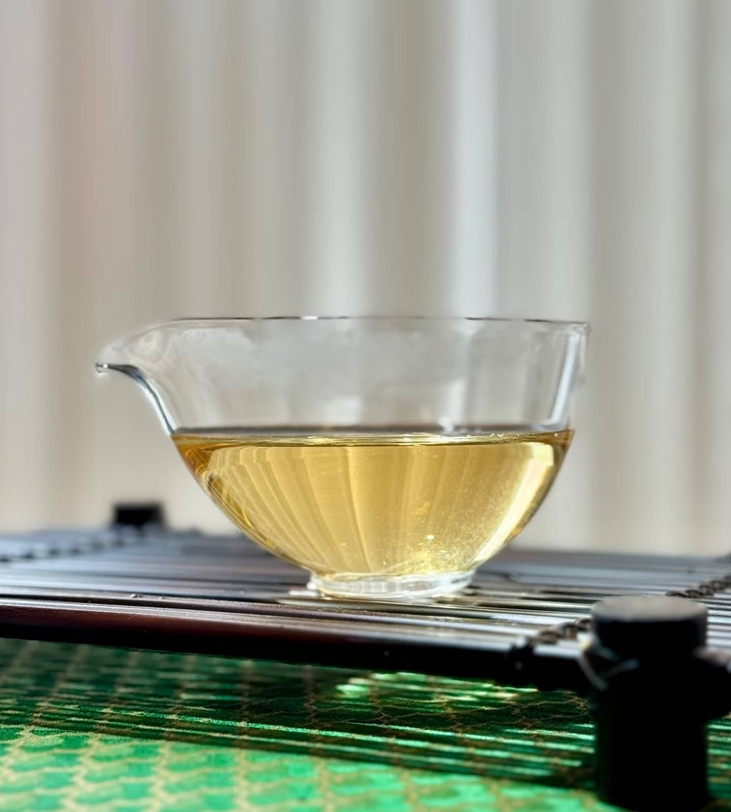 Aged Silver Needle white tea from 2020, six years matured. High-mountain single buds, honeyed aroma, warm medicinal notes, clear golden liquor. Four sealed tins — drink now or keep aging.
