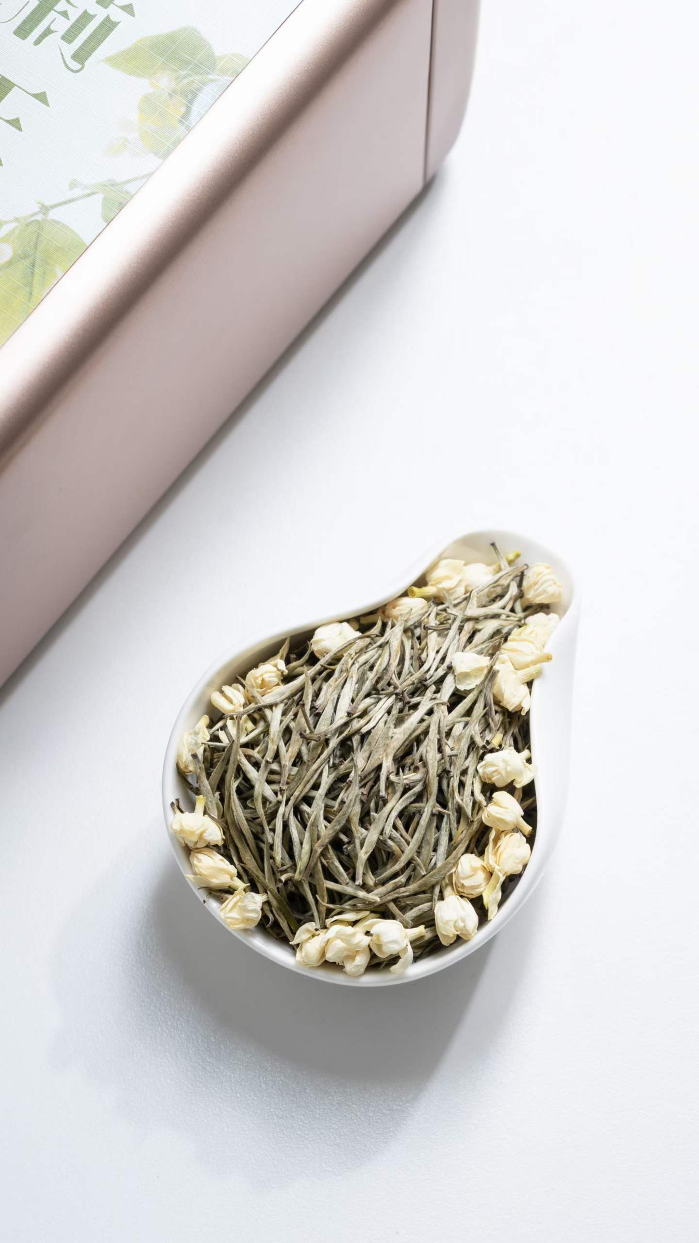 jasmine Needle King -- silver needle tea scented multiple rounds with fresh jasmine. Rock sugar sweet, 10+ steeps, fragrance that holds. 2026 spring harvest.