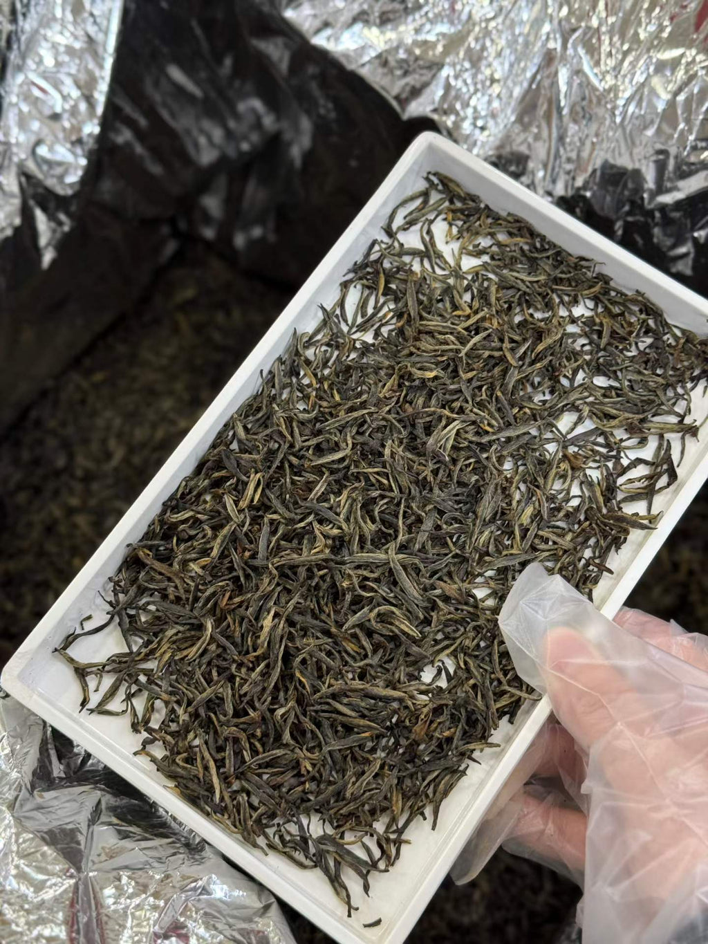 Mei Zhan Jin Jun Mei 2026 first flush black tea. Single bud, hand-processed. Orchid fragrance, honey finish, amber-gold liquor. Spring season, limited harvest.